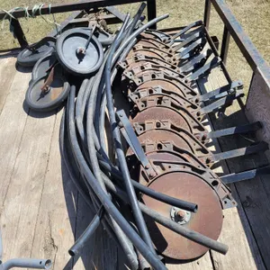 10 replacement disc's for JD air seeder. All discs turn, no bearings out. Will also fit on 9350 drills. Some packer wheels in good shape and some seed