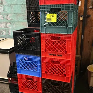 Quantity of milk and assorted bottle crates