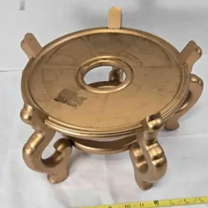 Gold tone planter stand