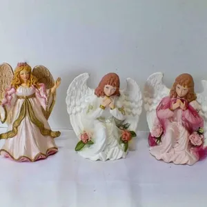 3 Vintage ceramic angel figurines - one angel has