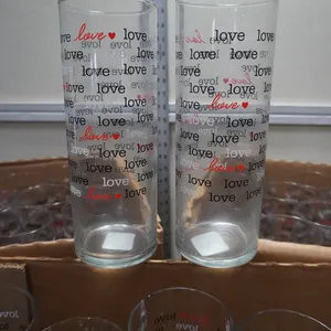 Libbey Glasswares 10-inch Cylinder "Love" Vases.