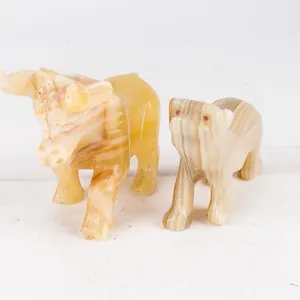 Mixed Pair of Carved Stone Animal Figurines