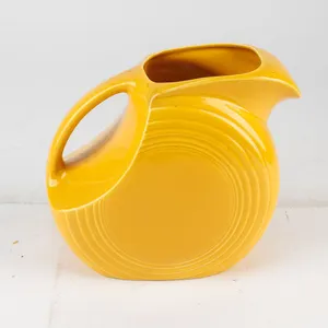 Vintage Yellow Fiesta Disc Pitcher