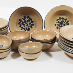 PFALTZGRAFF BOWLS AND SAUCERS WITH FLORAL DESIGN.
