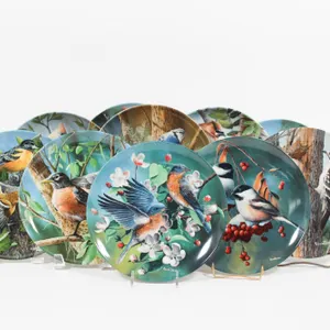 EDWIN M KNOWLES PLATES FEATURING VARIOUS BIRD DESIGNS.