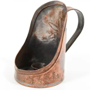 TINNED COPPER CANDLE HOLDER WITH DECORATIVE EMBOSSING.