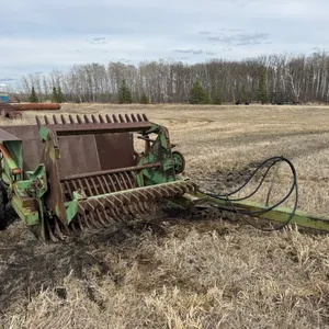 Crown rotary rock picker