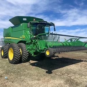 2015 John Deere S680 S-Series Combine, SN: 1H0S680SPF0776348 with John Deere 615P Pickup Header, SN: 1H00615PHF0775620.