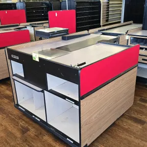 Reynolds Corporation Data 3000 Series dual belt checklane. Features a woodgrain laminate finish with red accent panels, cashier station, and built-in 