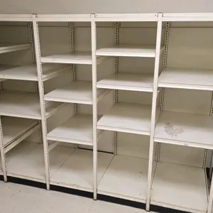 Metal multi-tier shelving rack. Features solid metal shelves. Dimensions: 1.5'W x 2'D x 5'H.