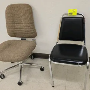 Lot of 2 armless chairs. Includes (1) chair featuring black faux leather upholstery and a silver-tone 4-leg frame, and (1) office chair featuring brow