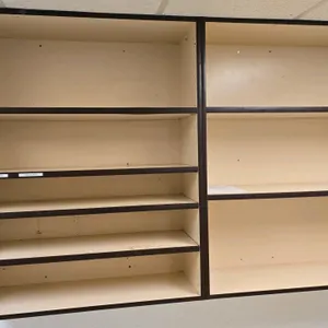 Laminate open wall cabinet. Features adjustable shelving. 40" x 48".