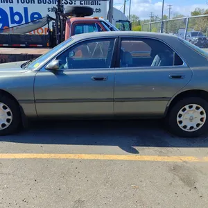 1997 MAZDA 626, 4 DOOR SEDAN, GREY, VIN 1YVGE22C5V5672417,