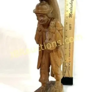 LARGE WOOD CARVED MAN FIGURE WITH INSTRUMENT
