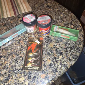 2 Rapala lurs and two gulp in heavy metal jigheads