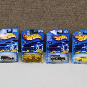 4 Hot Wheels Die-Cast Cars in Original Packaging