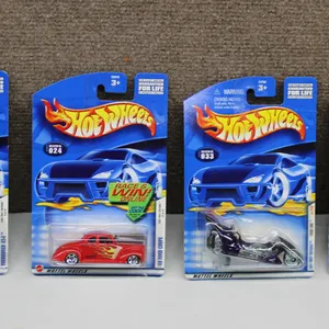 4 Hot Wheels Die-Cast Cars in Original Packaging, Various Models