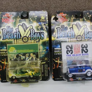 4 Hot Wheels Die-Cast Cars in Original Packaging, Including Beach Boys Editions