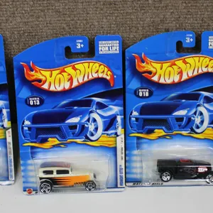 4 Hot Wheels Cars in Original Packaging
