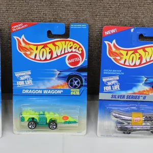4 Hot Wheels Die-Cast Cars in Original Packaging