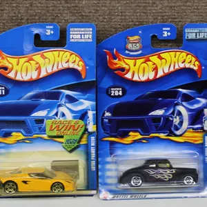 Four Mattel Hot Wheels Die-Cast Cars in Original Packaging