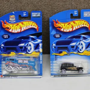 4 Hot Wheels Die-Cast Cars in Original Packaging
