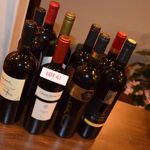 9 Bottles of Wine, not sure if the wine is drinkable, buy the bottles to make your own wine