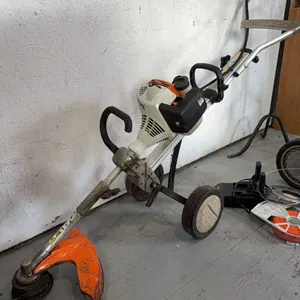 Stihl gas powered Yard Boss multi tool with easy start (trimmer, sweep, edger, tiller) *THIS ITEM AVAILABLE FOR LIVE ON-SITE BIDDING ONLY