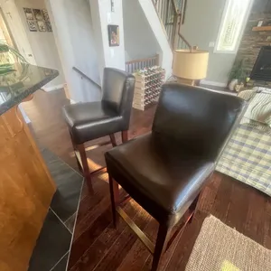 Two brown vinyl counter stools *THIS ITEM AVAILABLE FOR LIVE ON-SITE BIDDING ONLY