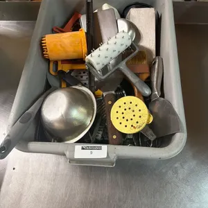 TUB CONSISTING OF KITCHEN UTENSILS