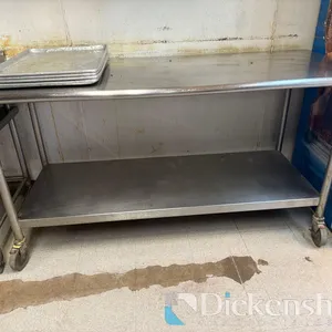 STAINLESS STEEL TABLE ON CASTERS with lower shelf-approximate