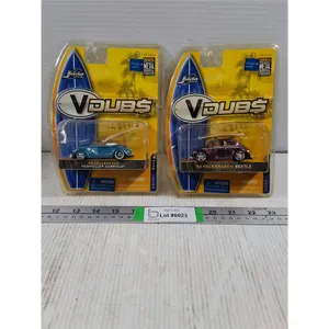 (2) 1:64 1949 Volkswagen Cabriolet and 1959 Beetle