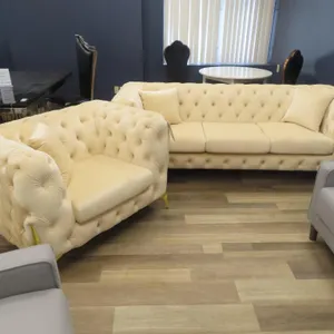 Lot - American Goose 2 Pc. Sofa and Chair Set - Off White Cloth.