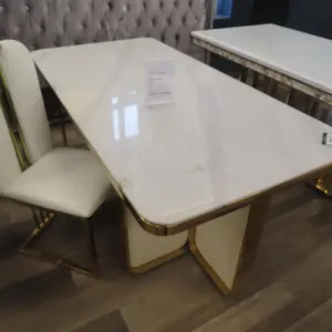 American Goose 36" x 71" White Marble Style, Brass Base Table, w/ (1) White Leather Chair.