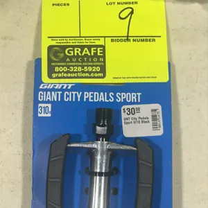 Giant City Pedals Sport. Features black and silver-tone construction. 9/16" spindle thread. Packaging indicates 310g weight.