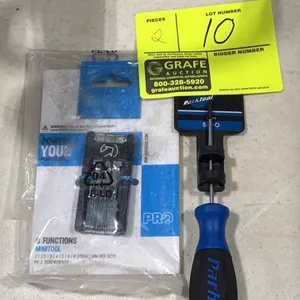 Bicycle tool lot. Includes (1) Park Tool SD-0 #0 Phillips screwdriver and (1) PRO 8-function minitool. Minitool features 2, 2.5, 3, 4, 5, 6, and 8mm h