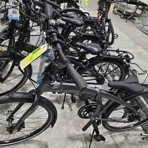 Tern Eclipse D16 bifold bicycle. Features a Matte Gunmetal/Grey finish, 16-speed drivetrain, disc brakes, front and rear fenders, and a kickstand. Inc