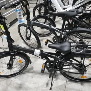 Tern Node D7i folding bicycle. Features a black finish, 7-speed shifter, front headlight, bell, fenders, rear cargo rack, and a kickstand. Frame Numbe
