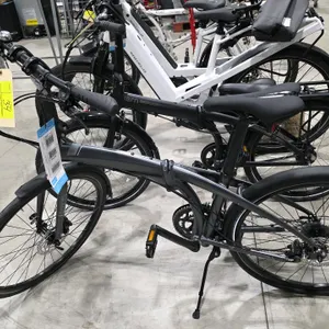 Tern Eclipse D16 folding bicycle. Features a Matte Gunmetal/Grey finish, multi-speed gearing, disc brakes, mudguards, and kickstand. S/N: CIDDO16HKX07