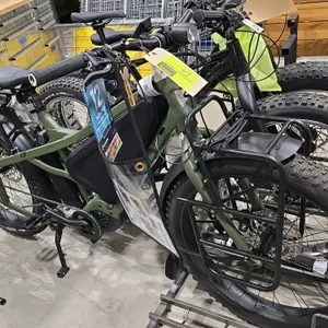 20” Frame Tern Orox adventure cargo E-bike. Features an olive green frame, Bosch mid-drive motor with Bosch Purion controller, LED headlight, front an