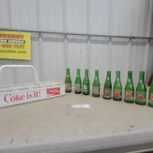 Vintage 7UP Green Glass Bottles and Arena Sales Carry Coca-Cola "Coke Is It!" Wire Display Rack