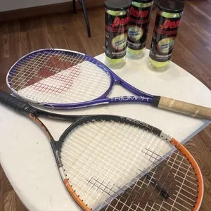 Head and Wilson tennis racquets and Penn tennis