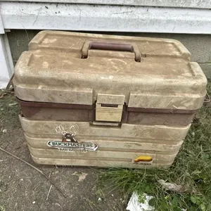 Brown tool box with included Bow hunting