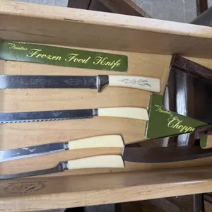 Vintage stainless cutlery, advertising knives