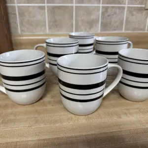 Glass platter, coffee mugs (7)