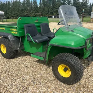 John Deere 4x2 Gator w/ Electric Tilt Dump Box, 452hrs, VIN W004X2X056139, LED Light, AT 22.6x10-8 Frt Tires, 25x12.00-9 Rr Tires, Always Shedded