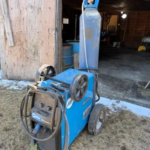Millermatic 252 Mig Welder w/ Argon Gas Tank (Nearly Full), (On original spool of wire), Like New, and Accessories (W), Bought New 2021