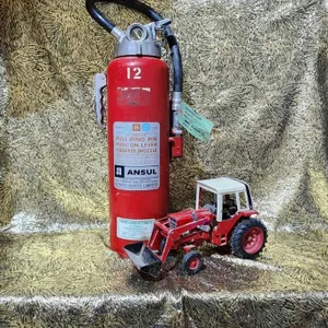 ANSUL Fire Extinguisher Model Sentry with Diecast International 1586 Tractor