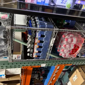 4'W x 7'H Chrome Rack on Wheels w/ Contents including16 Mostly Full Cases of Pop/Water Complete
