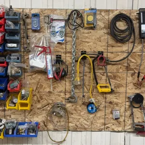 Wall‑Mounted Hardware & Shop Supplies Lot w/ Parts Bins, Chains, Cables & Tools